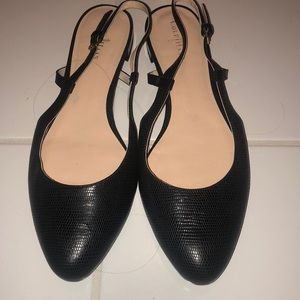 Black Cole Haan slip-back sandals